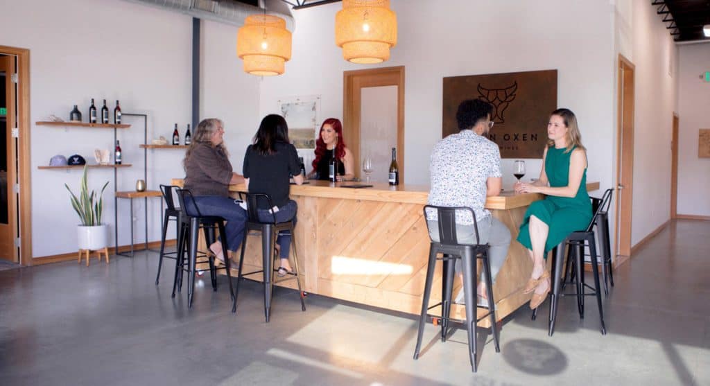 seven oxen tasting room with customers
